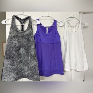 Bundle of 3 lululemon athletica Purple, White, and Heather Tank Tops